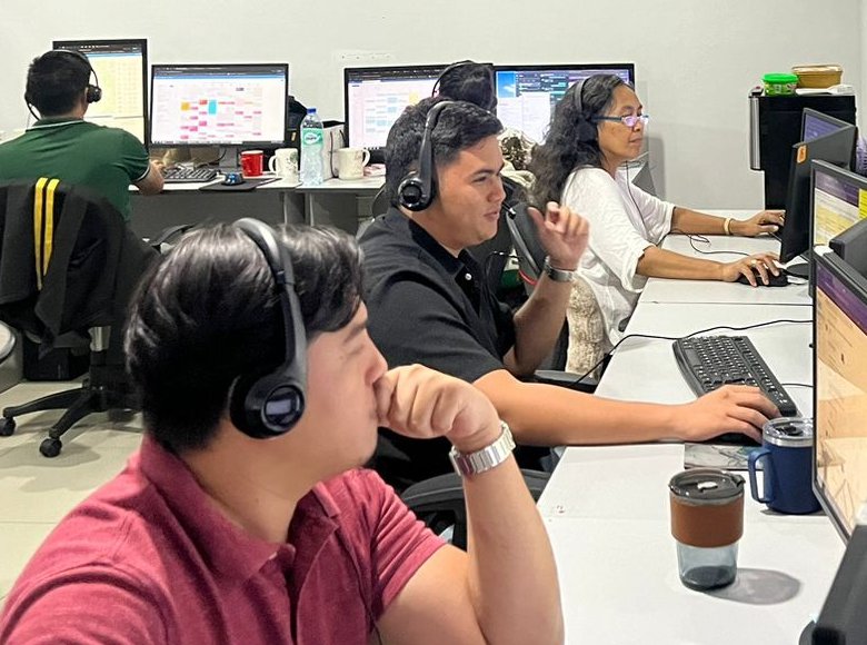 Duet remote dispatchers wearing headsets, taking calls at their stations